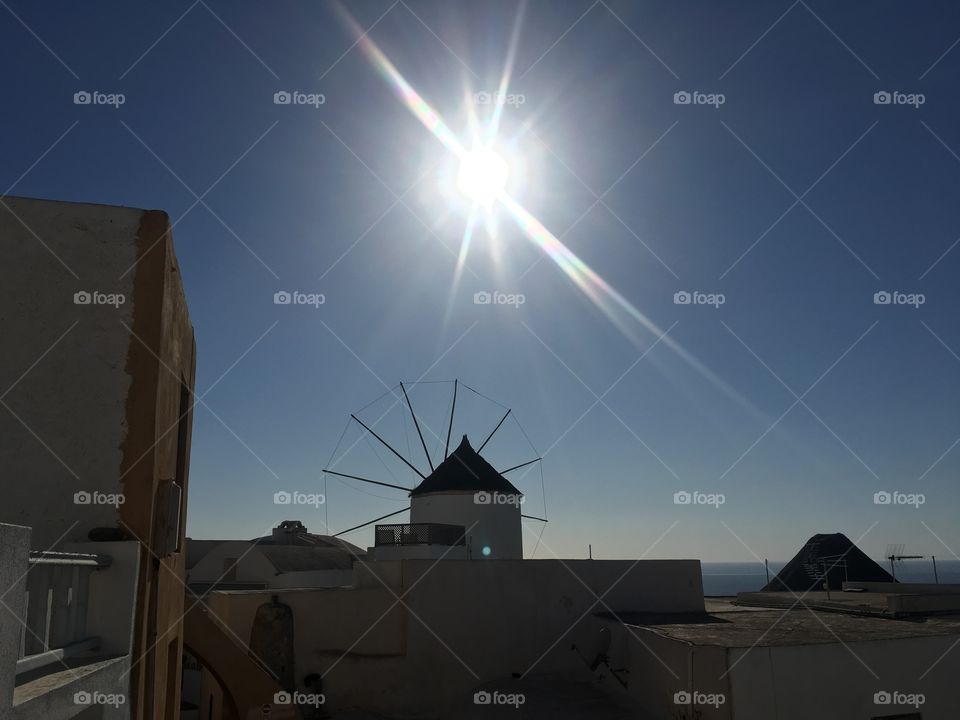 Sun over windmill
