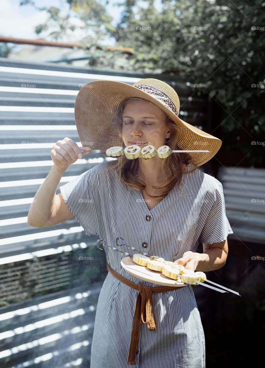 woman BBQ vegetables