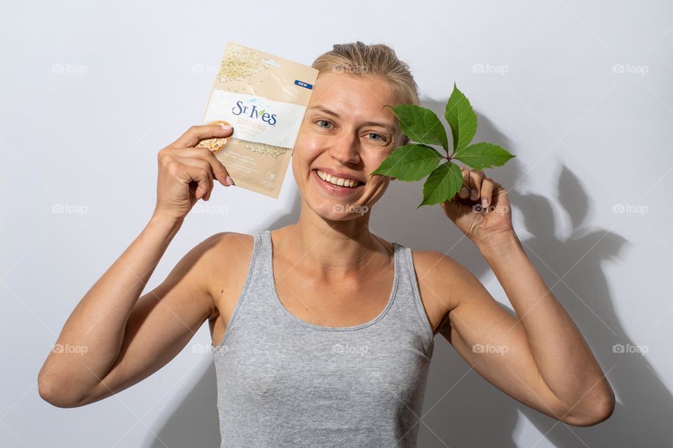 woman hands holding beauty products