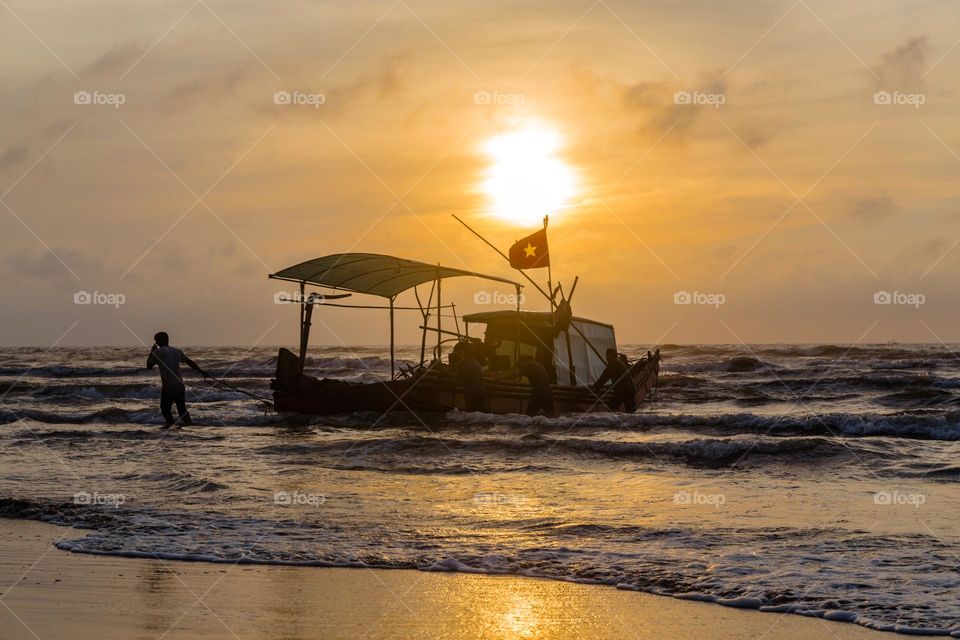 the Fisherman go home in sunrise