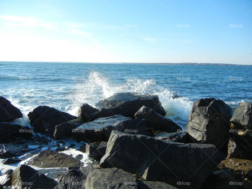 waves crashing against rocks