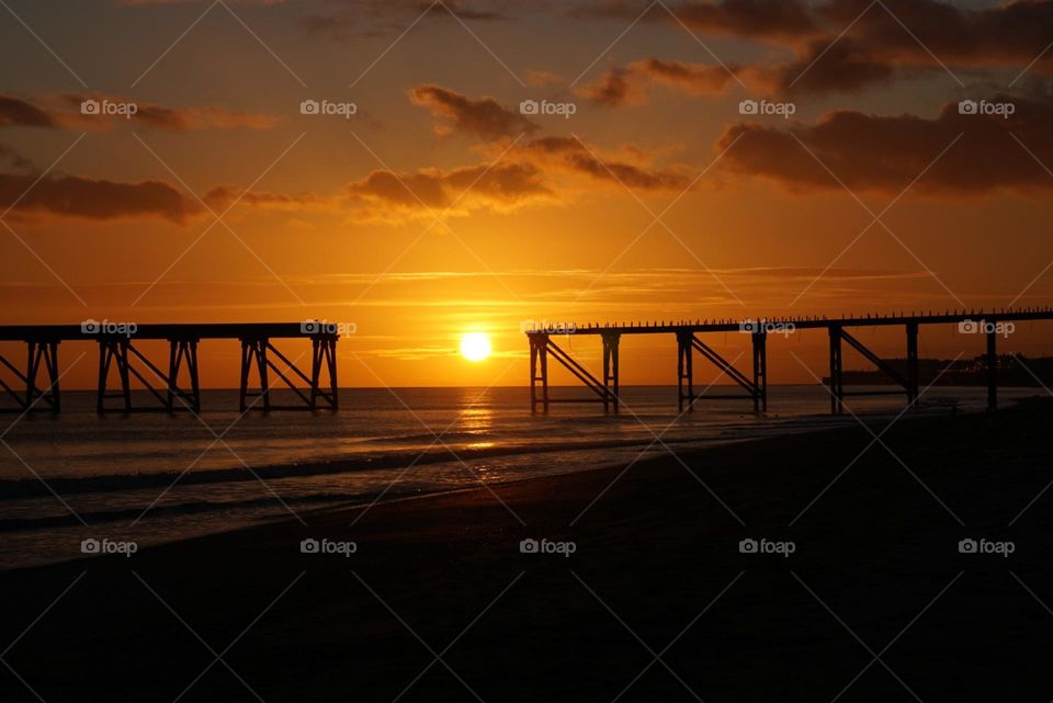 sunrise over the pier