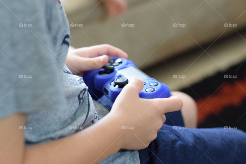 A kid playing video game 