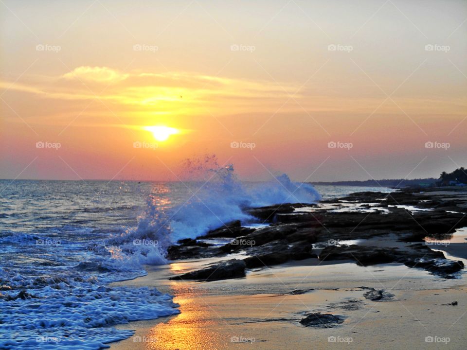 seashore wave and sunset