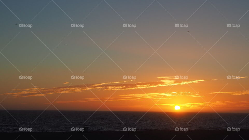 Sunset in Santa Monica beach. Santa Monica California Pier sunset beach