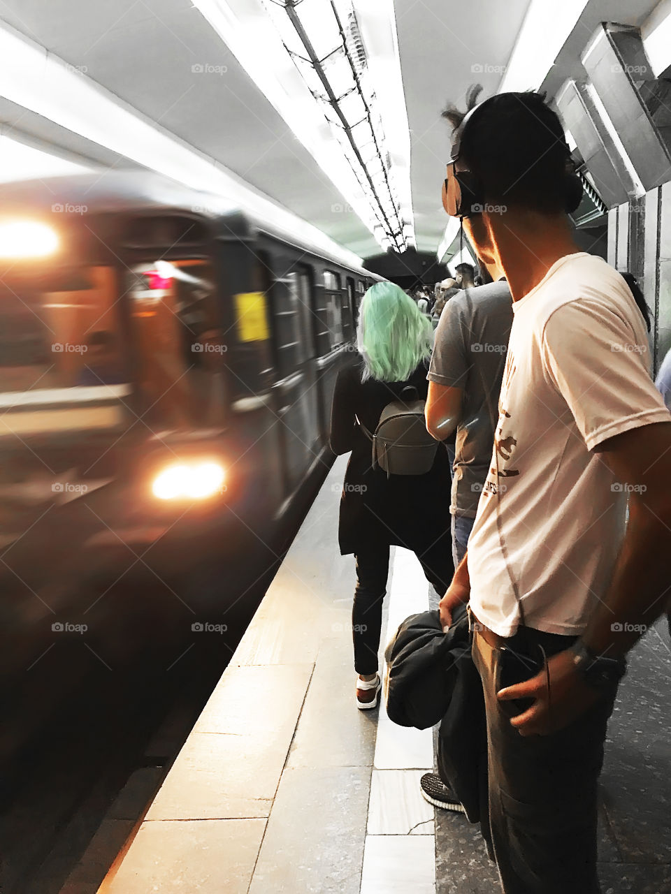 People waiting for a subway train 