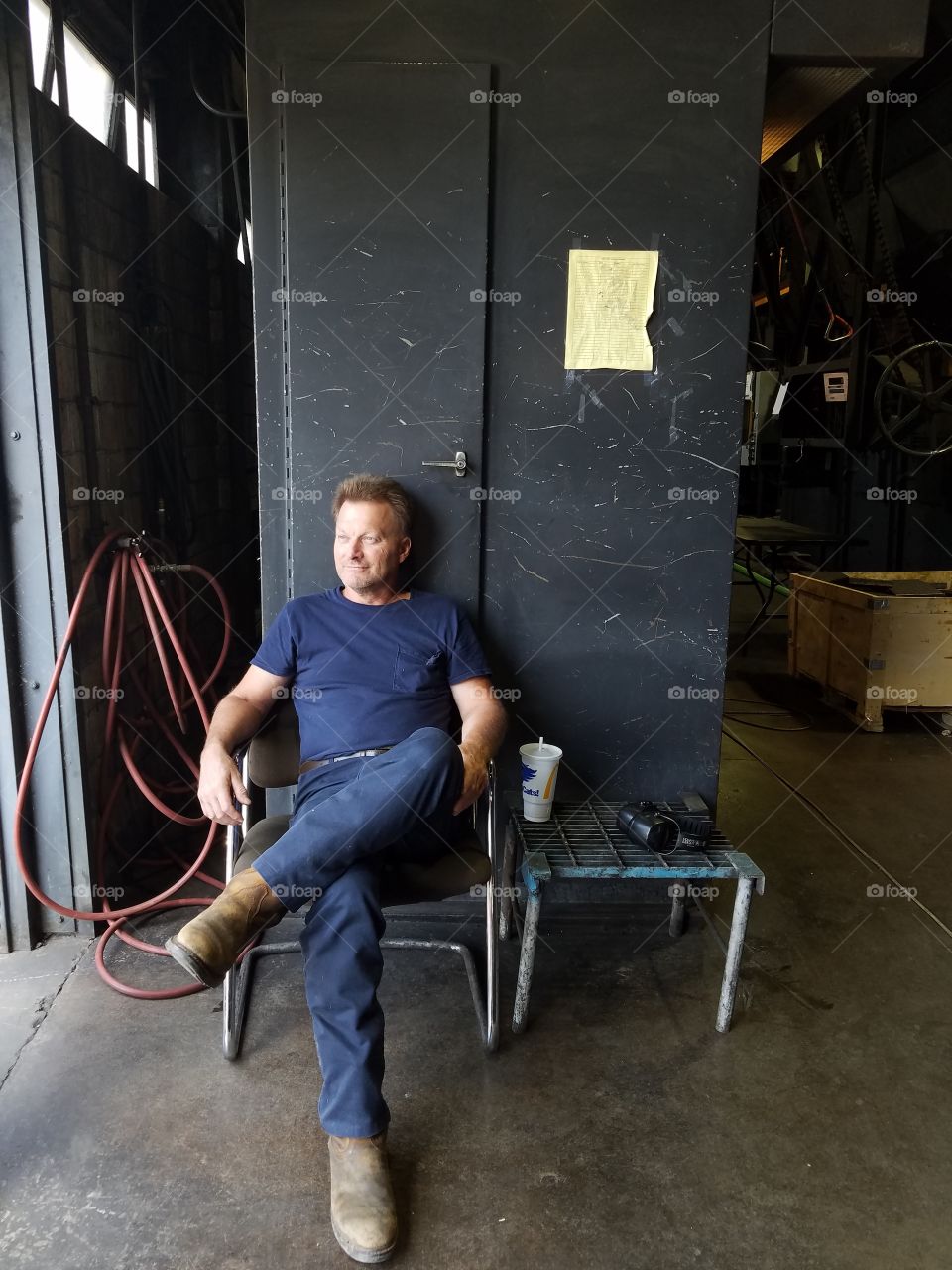 Operator takes a moment to relax during a hard day