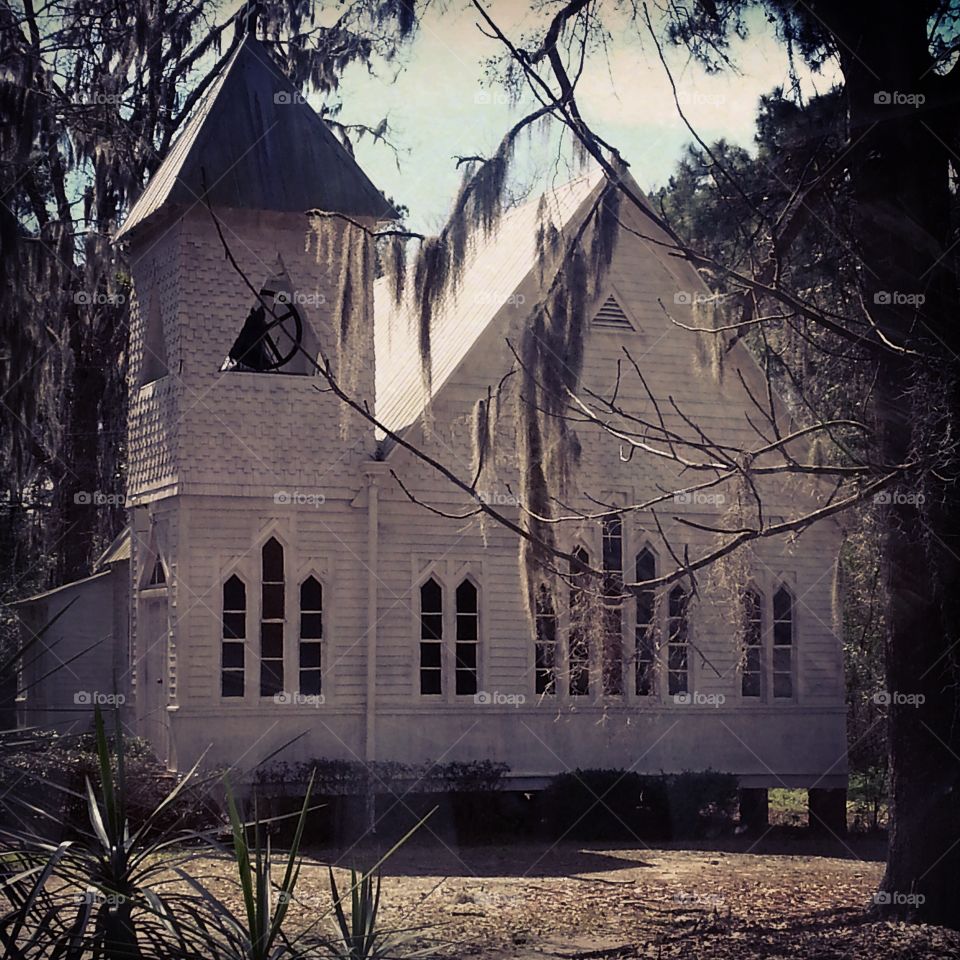 Episcopal Church with southern moss. Cool looking old wooden church