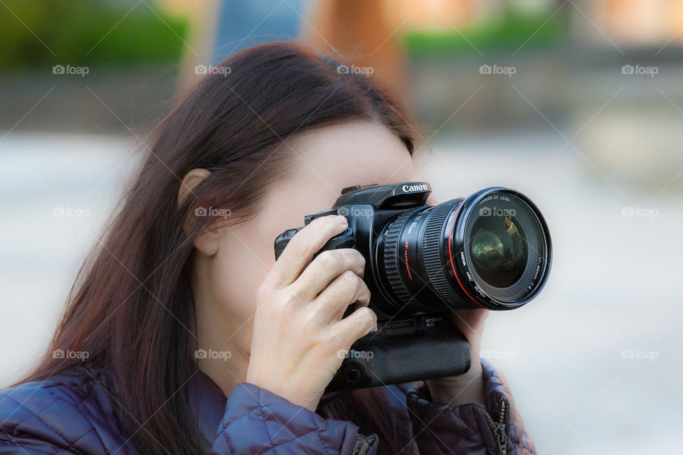 Roman photographer with camera