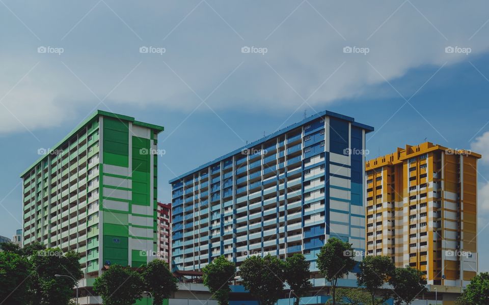 Colorful tower of an apartment buildings, a day in Singapore