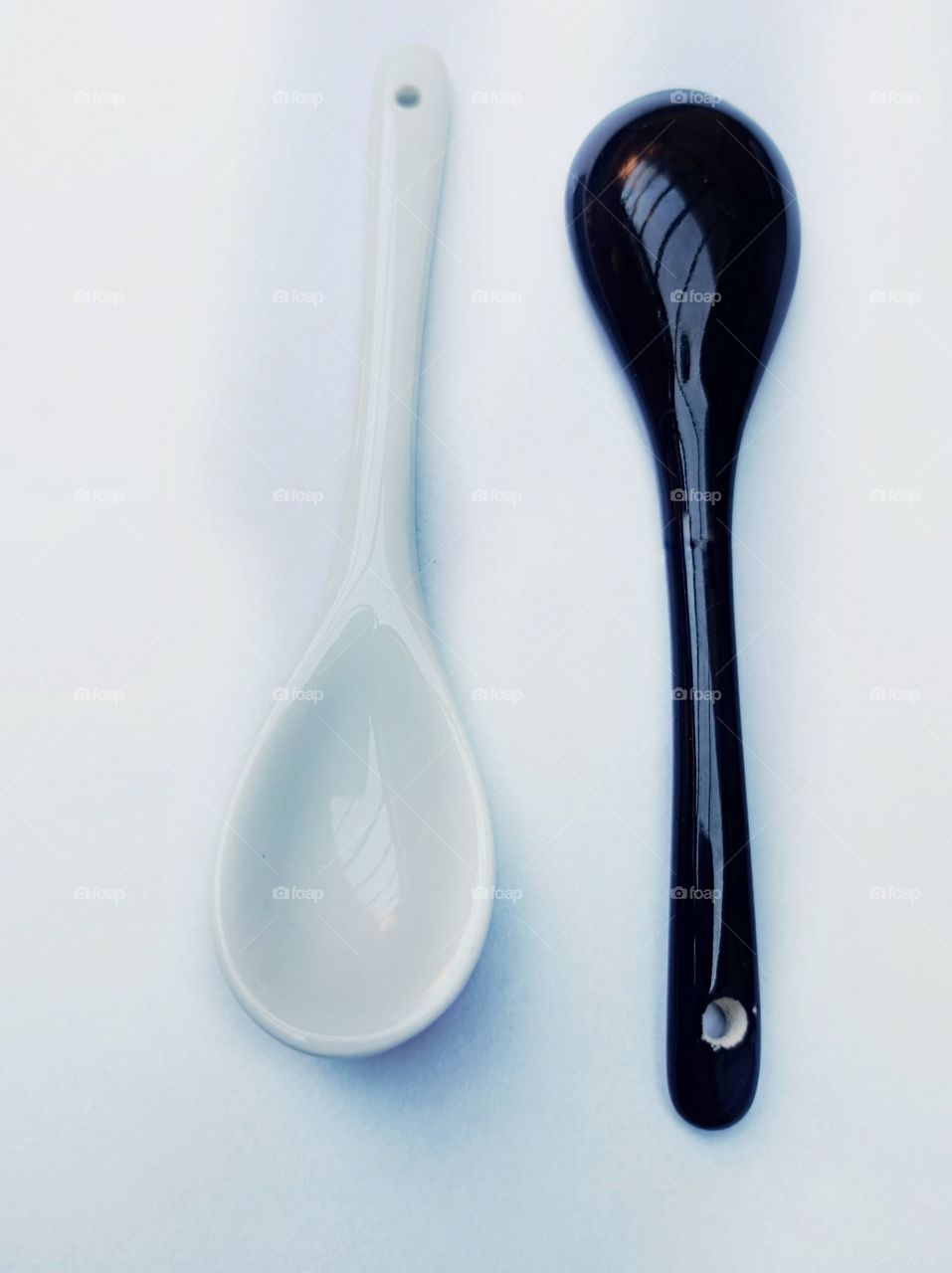 Black and white, concave and convex spoons