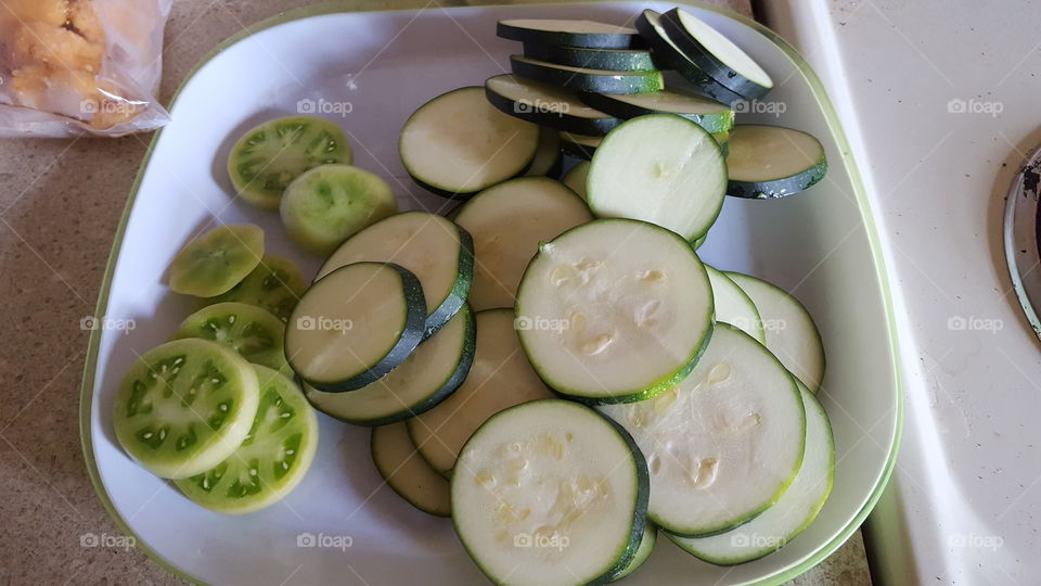 green tomatoes and zucchini