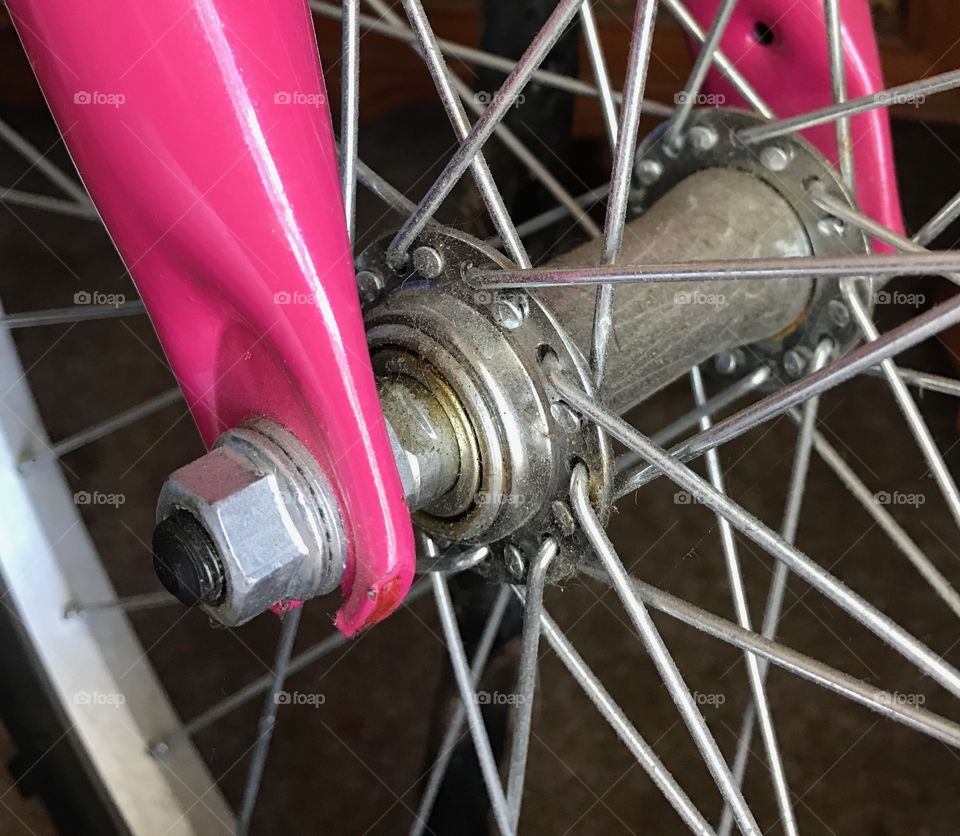 Spokes of my bicycle...I like the pop of pink!
