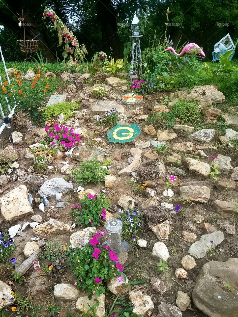 Work inn process,  making a rock garden over our mound system