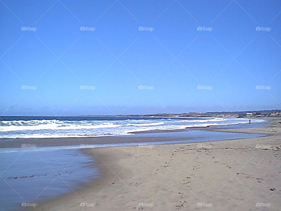 Beach with waves coming to shore