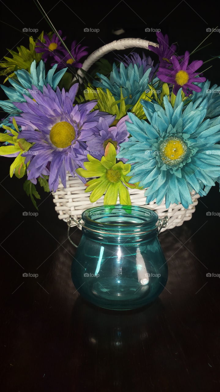 blue glass white colorful flower bucket