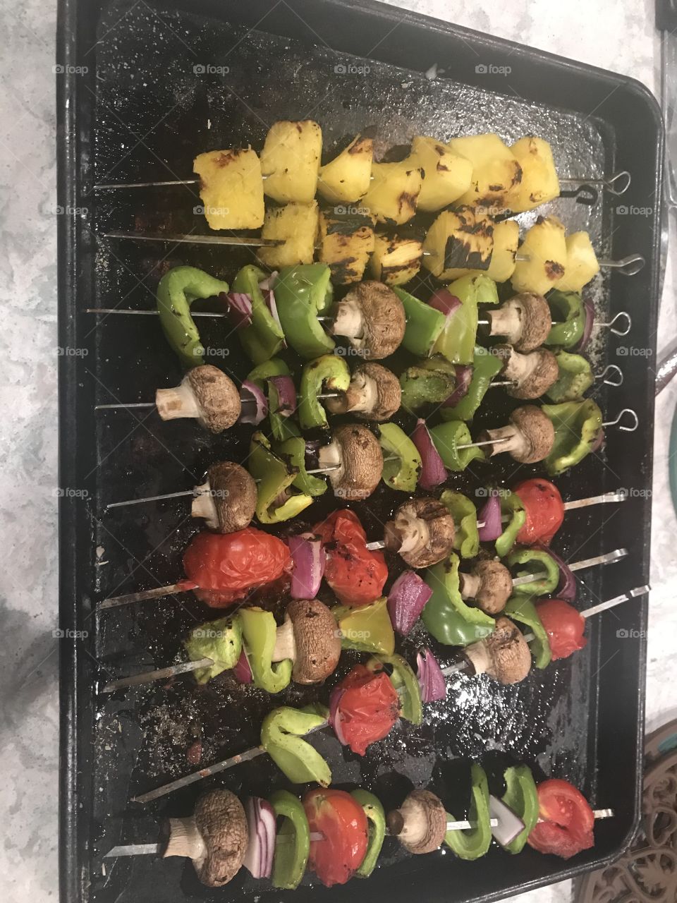 Skewers of veggies on the grill