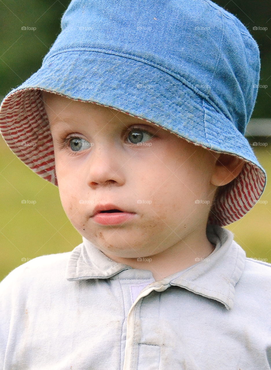 Cute toddler in summer hat