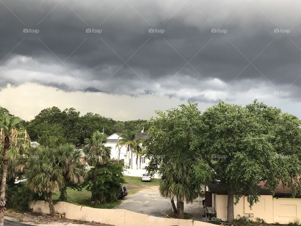 Aerial view of ominous storm clouds rolling into the area