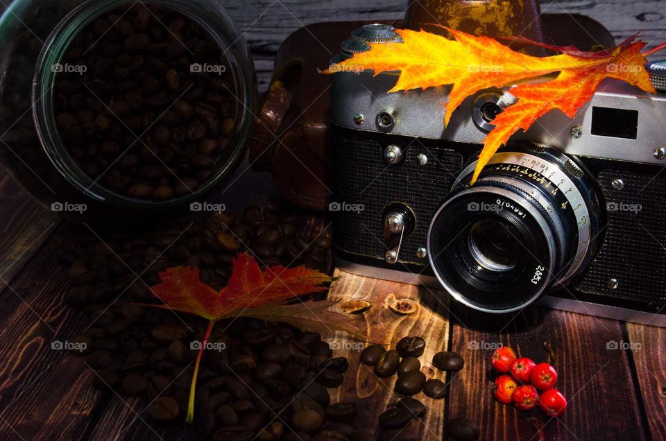 coffee been still life on wooden background