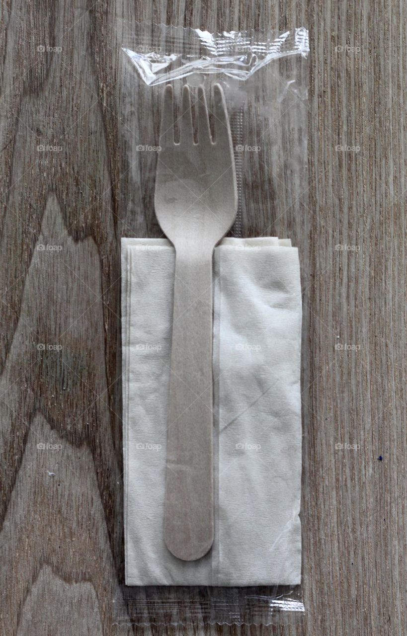 Wooden fork in plastic wrap. Eco friendly?