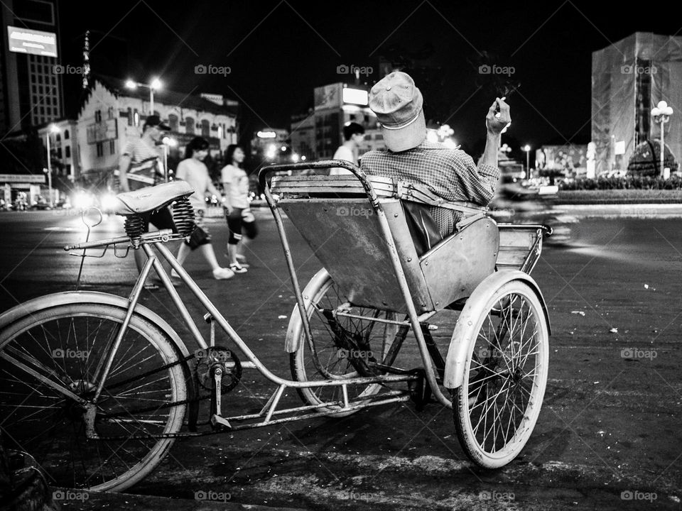 Saigon rickshaw taking a break