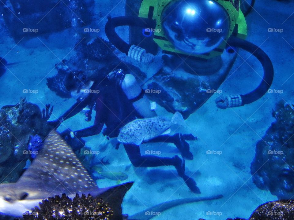 Underwater Exploration. Scuba Diver With Mini-Submarine Exploring A Coral Reef