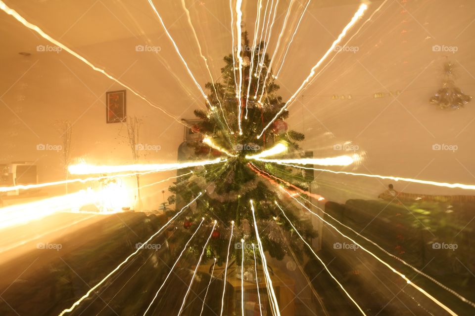 À long exposure photo of our Christmas tree, now it's like the elfs are flying out of the tree