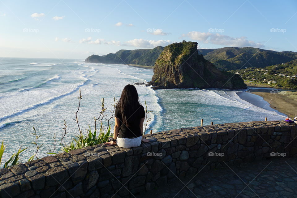 enjoy sunset on piha beach