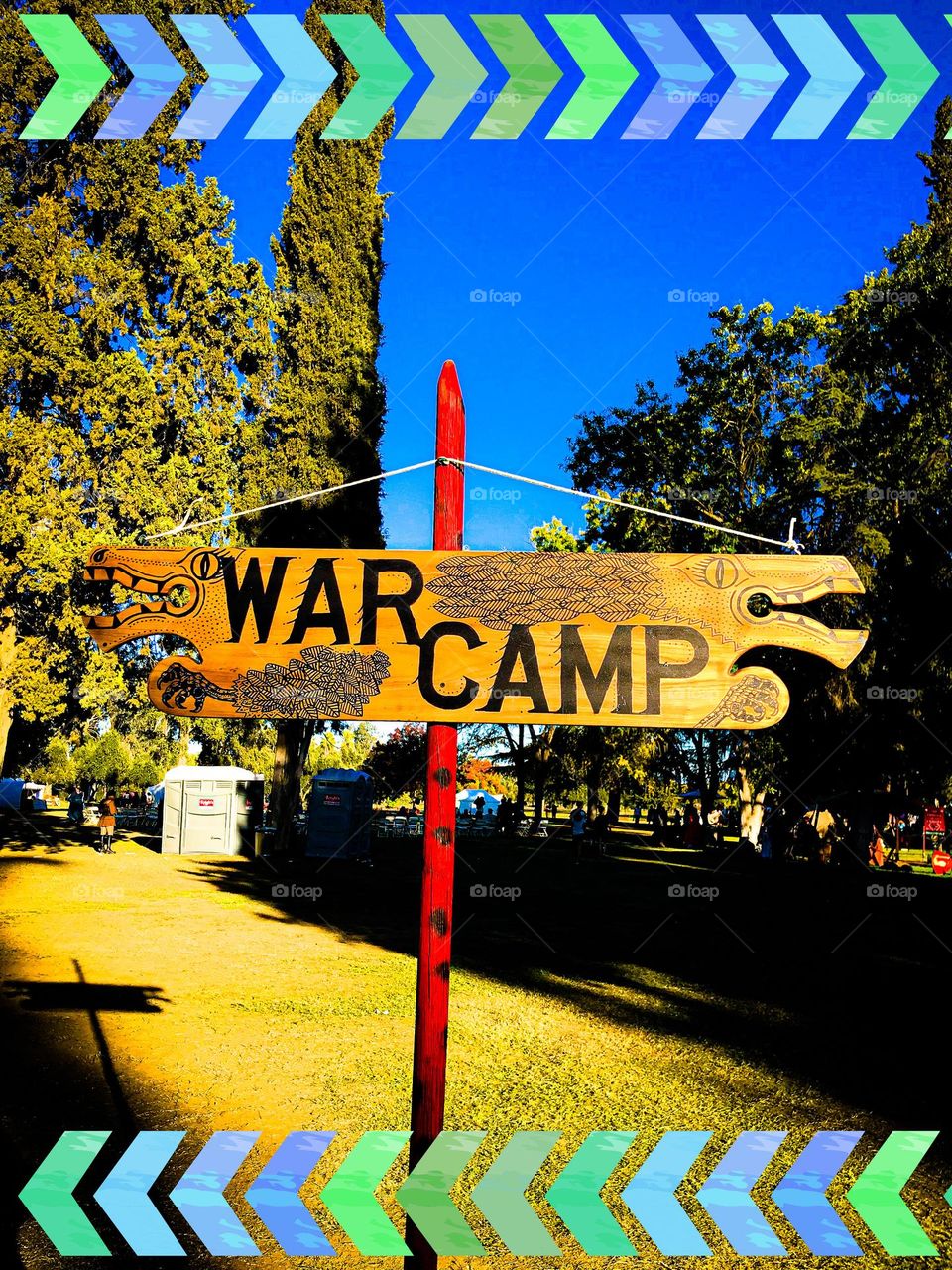 A wooden sign indicating the location of the war encampments of the Renaissance guilds at the Kearney Park Renaissance Faire.