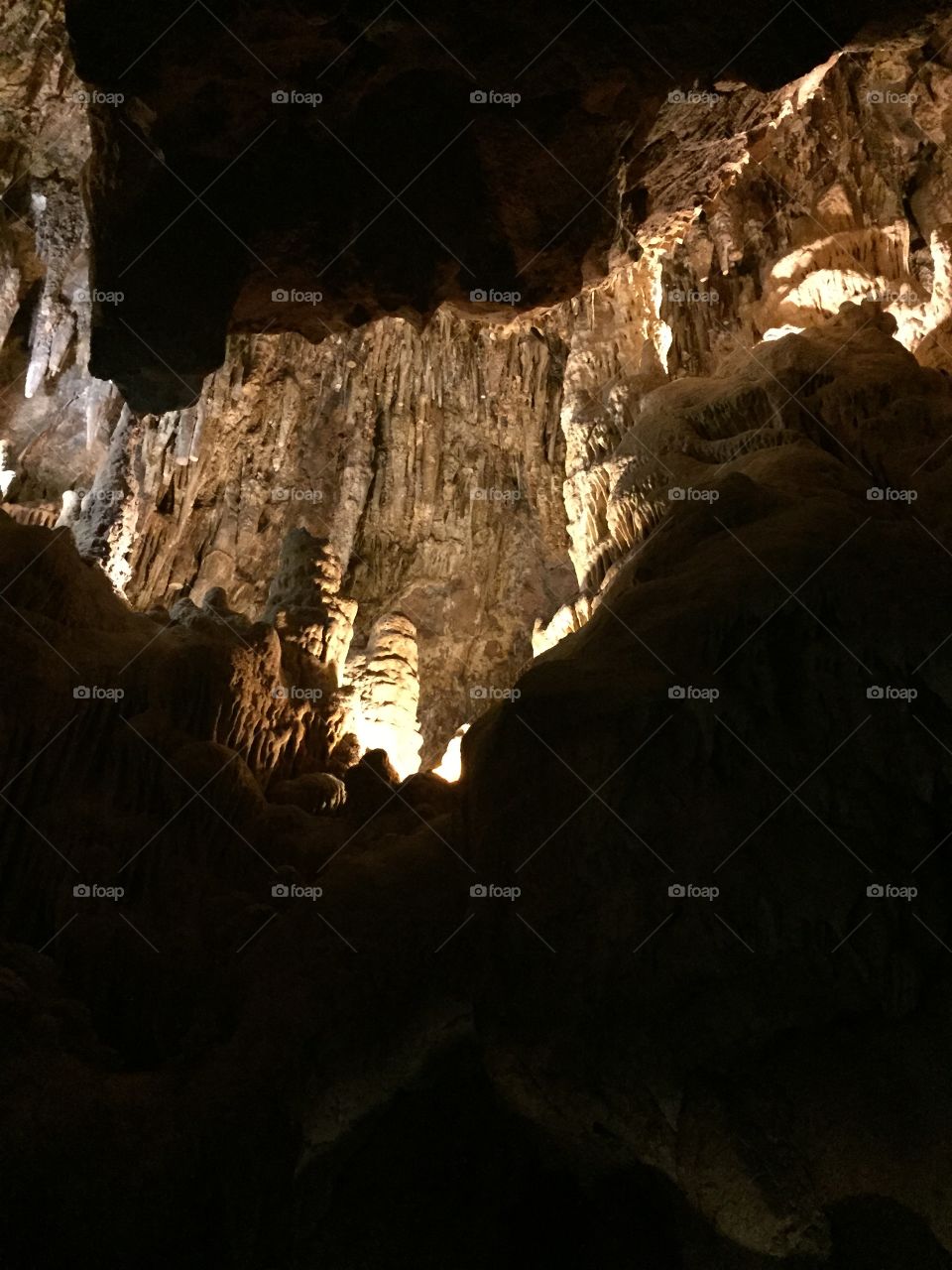Stalactites abound deep in a cave system