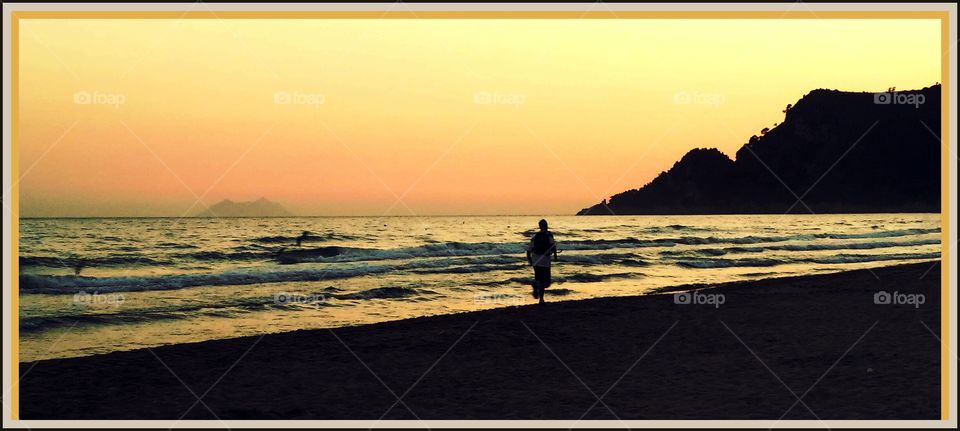 Jogging in the evening. I added a heavy filter.