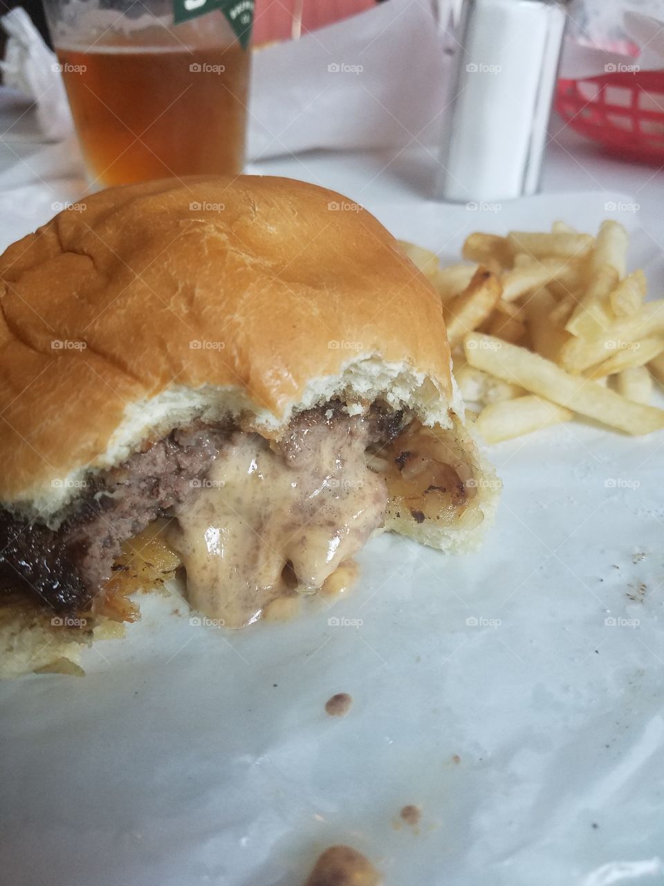 Juicy Lucy burger in Minneapolis with french fries