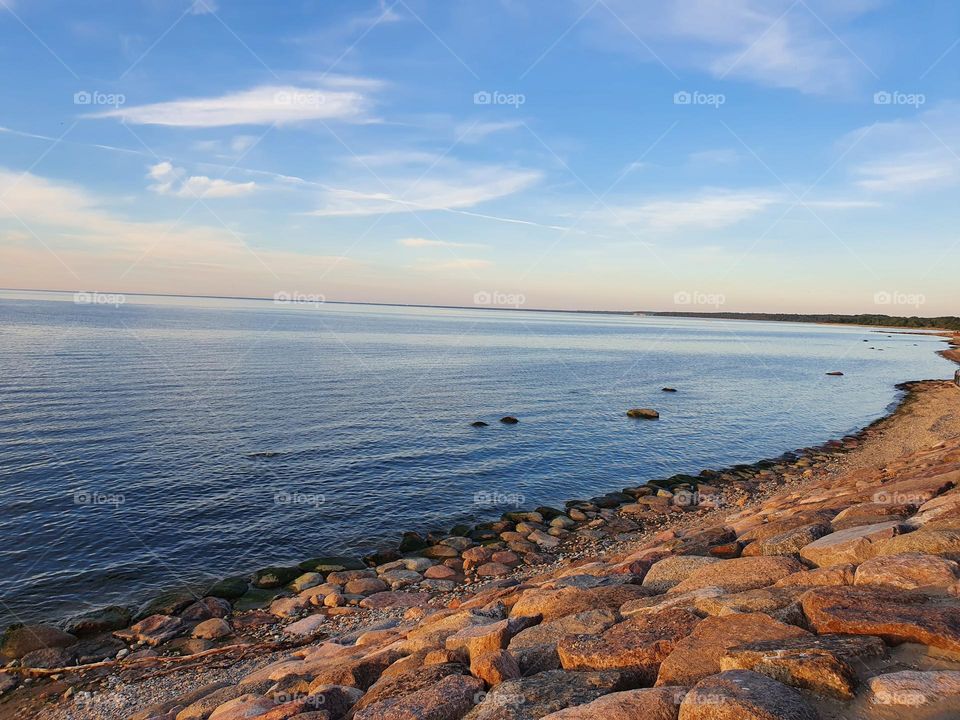 Calm sea on a sunny summer evening.