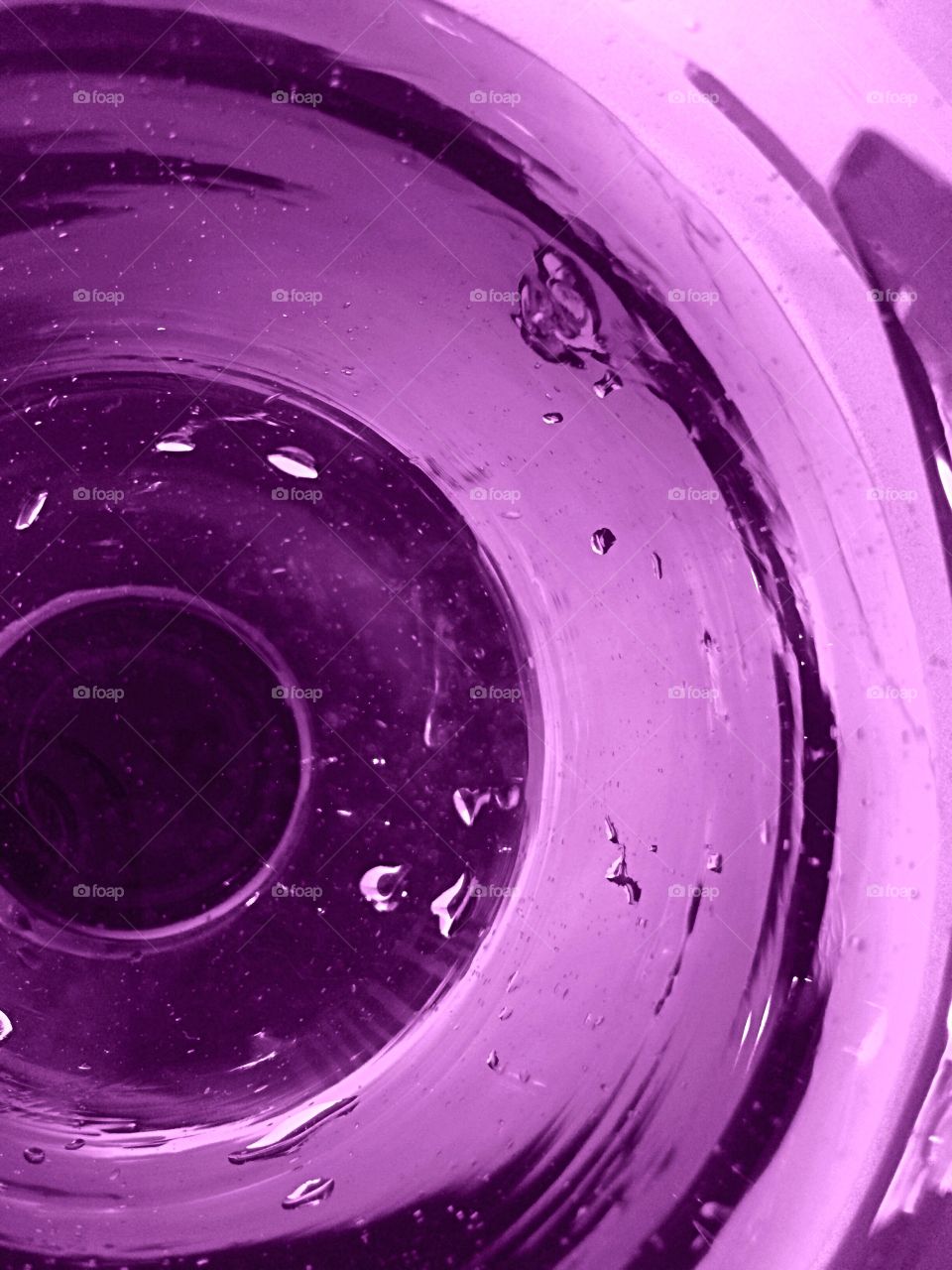 Macro close-up of purple washing machine