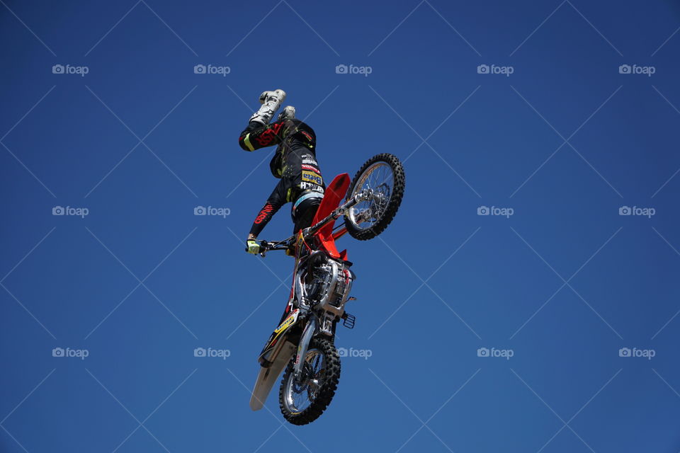 Stunt rider performing on a motorcycle