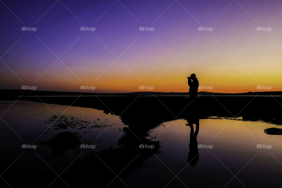 Taking photo in sunset