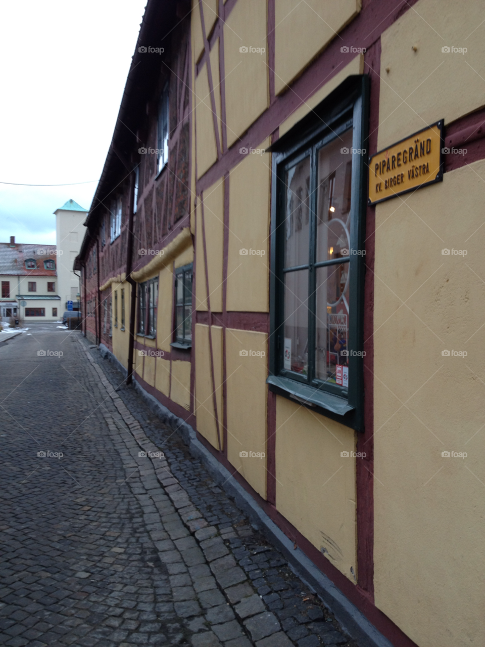 yellow streetsign housewall by liselott