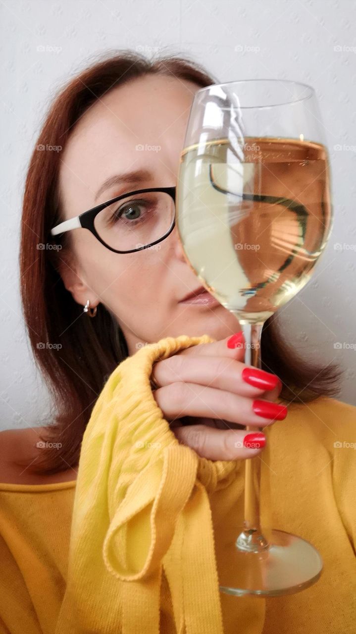 Selfie. Woman and glass of wine.