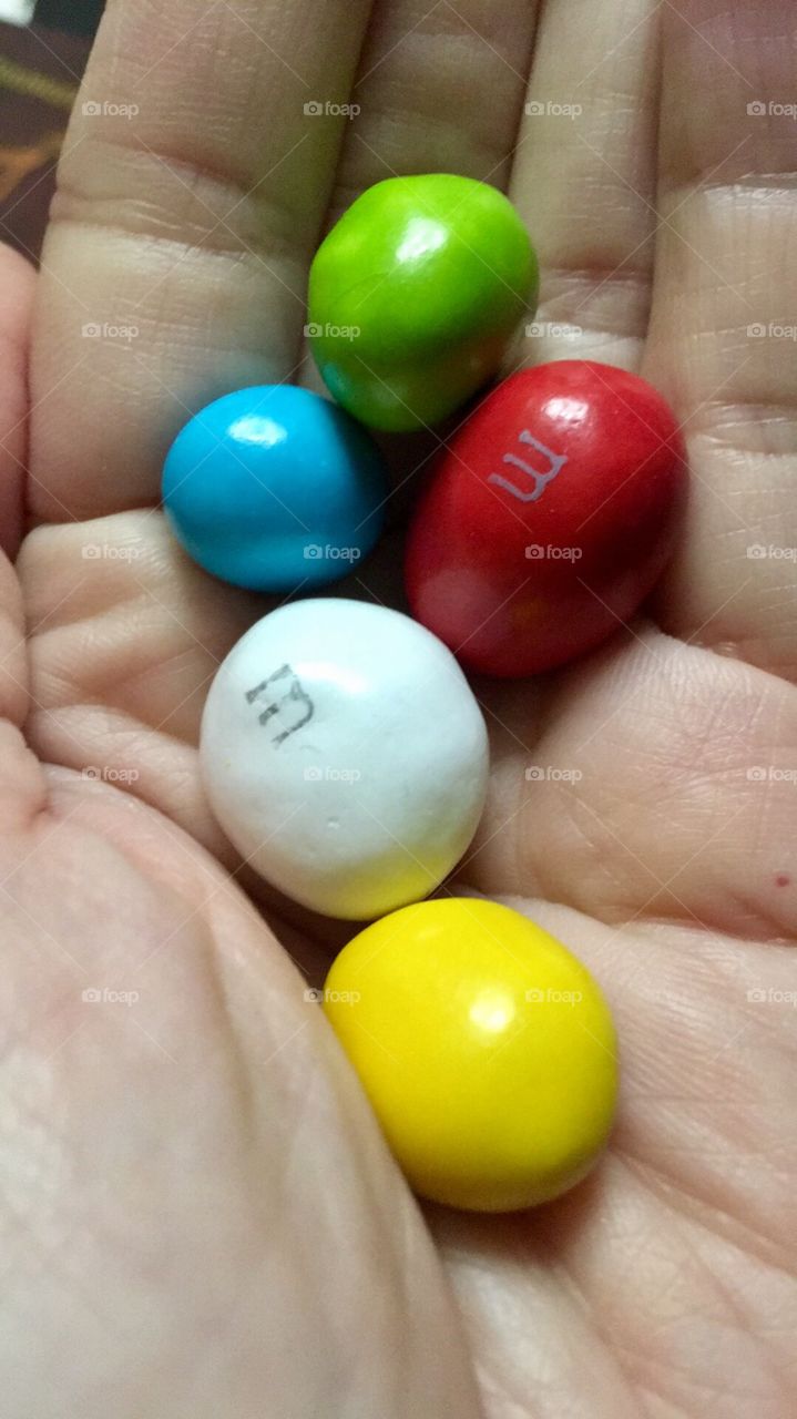 Hand full of M&M
Sweets