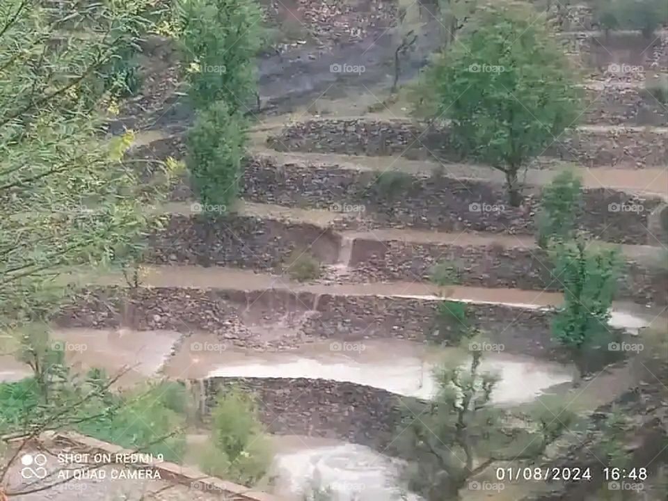 Glory be to God, the magnificent and picturesque view and the natural green trees are a view that is nothing more wonderful than it