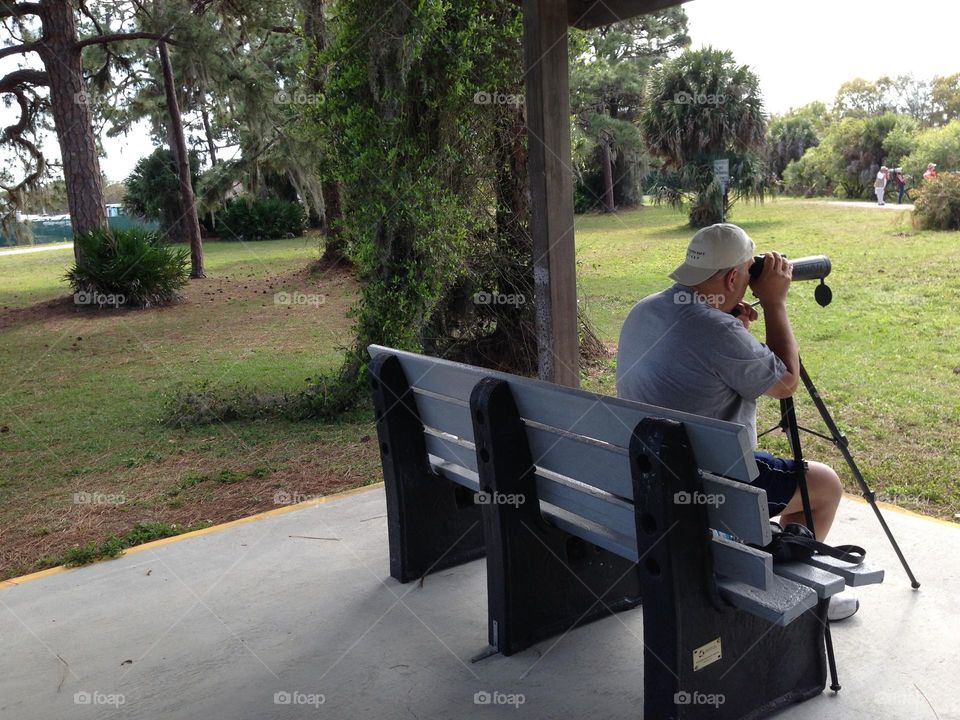 Photographer with tripod.