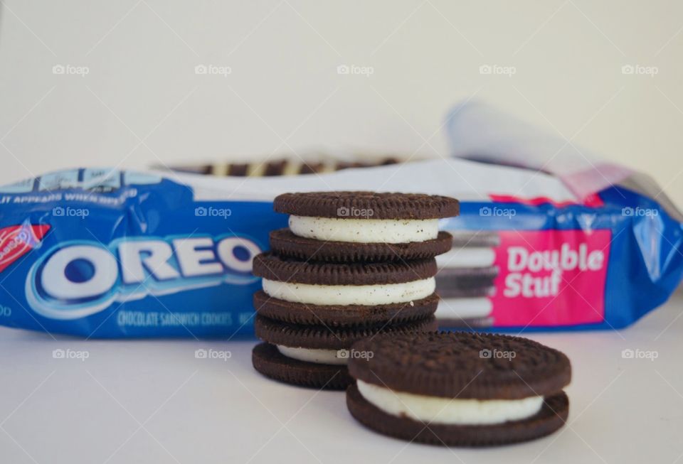 Double stuff Oreo cookies stacked in front of an open package