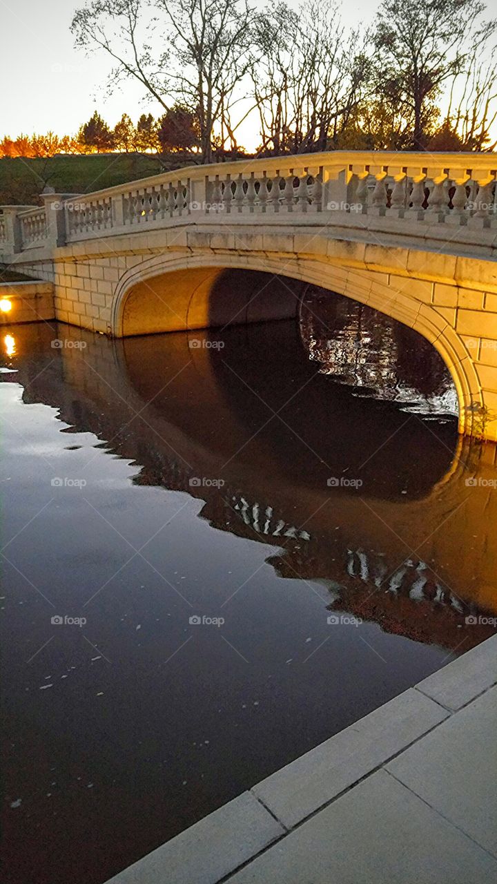 Bridge reflecting in lake