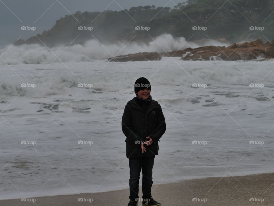 boy sea waves