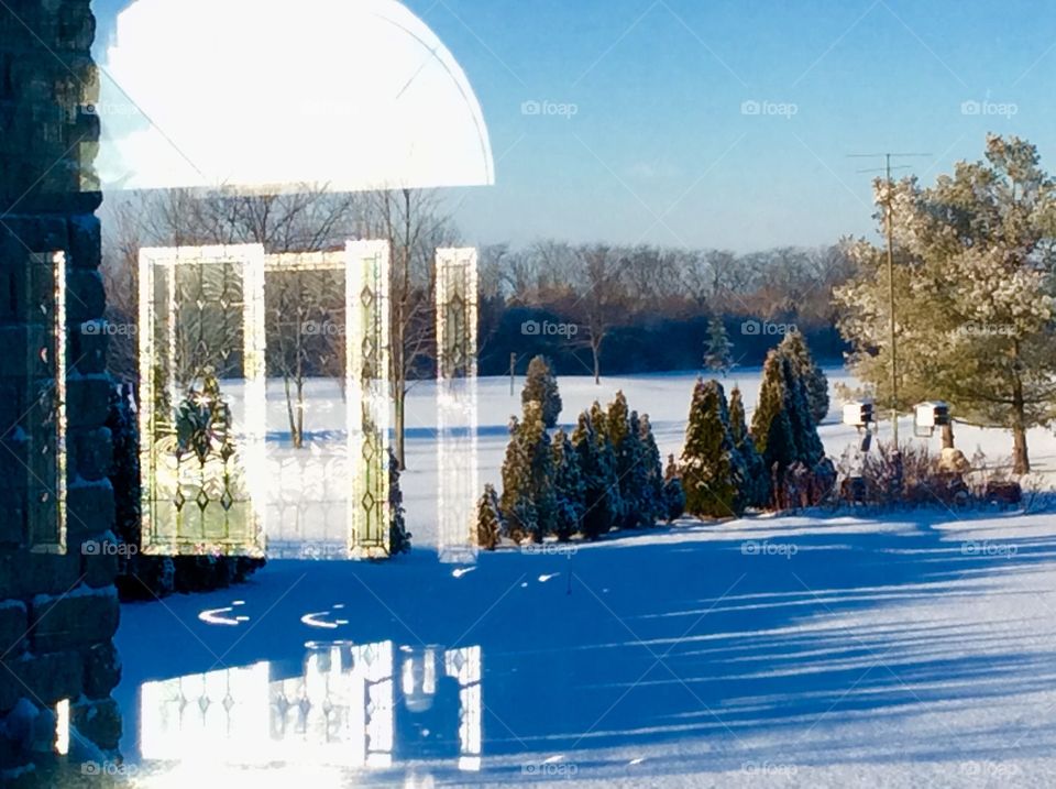Window light reflection in the backyard