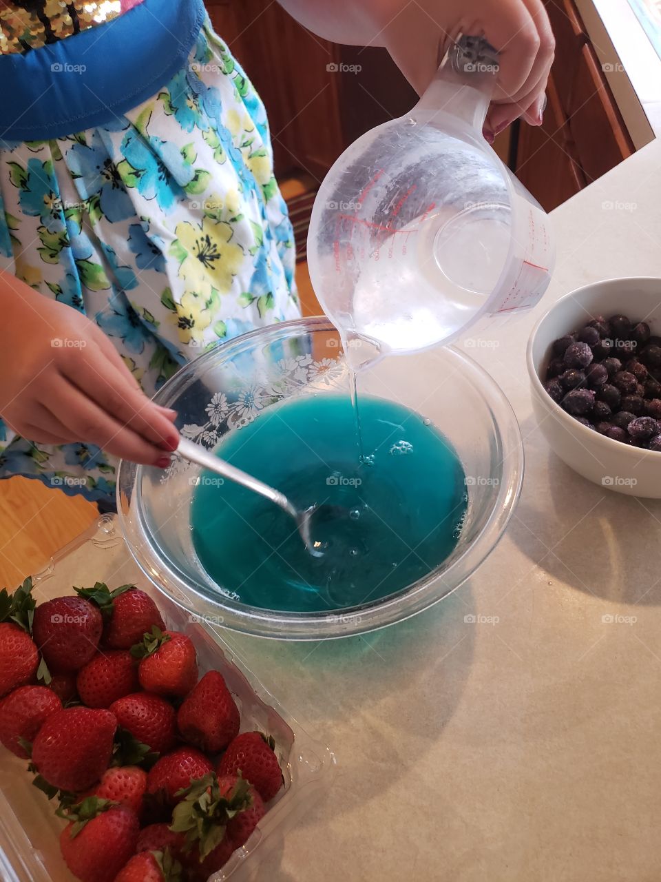 stirring liquid into desert jello