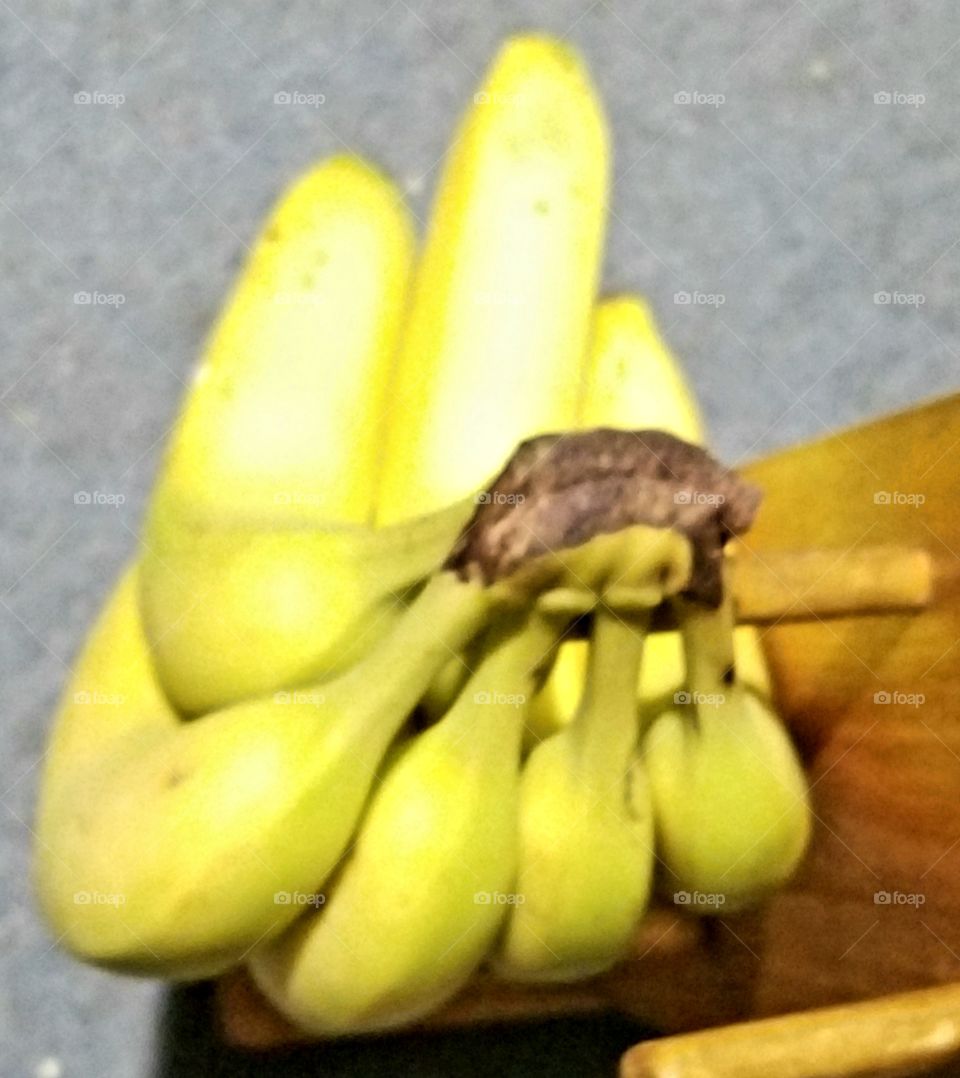 Bananas on wood hanger