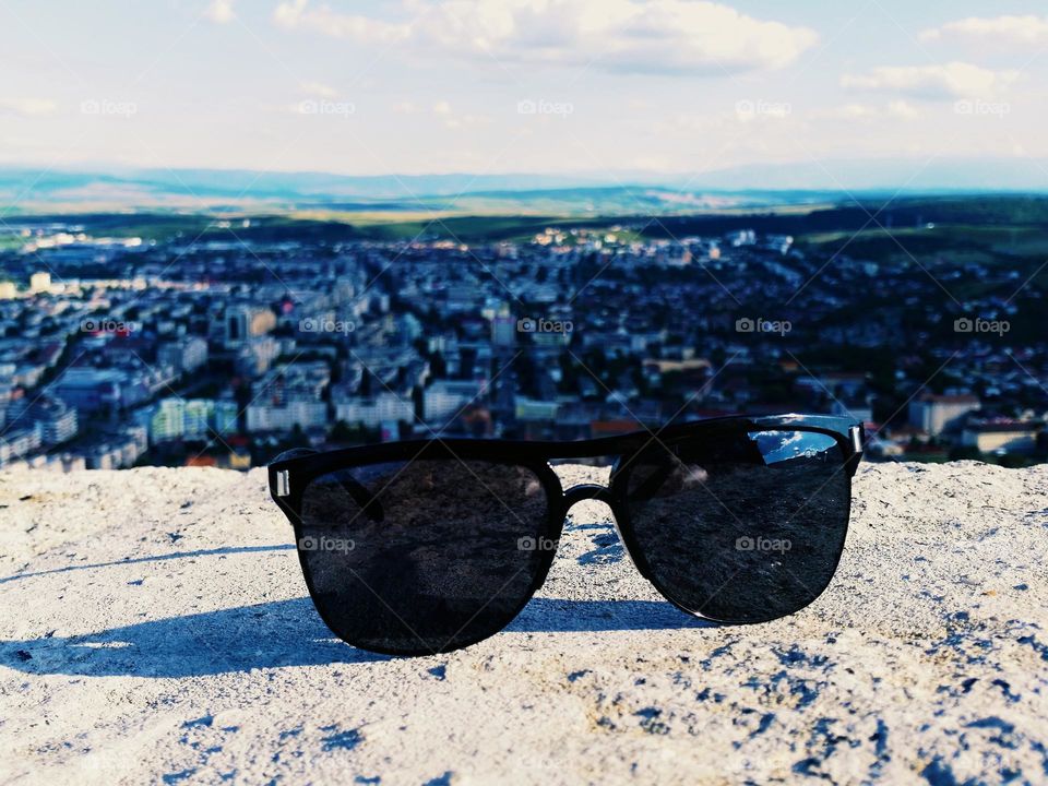 sunglasses above the city of Deva