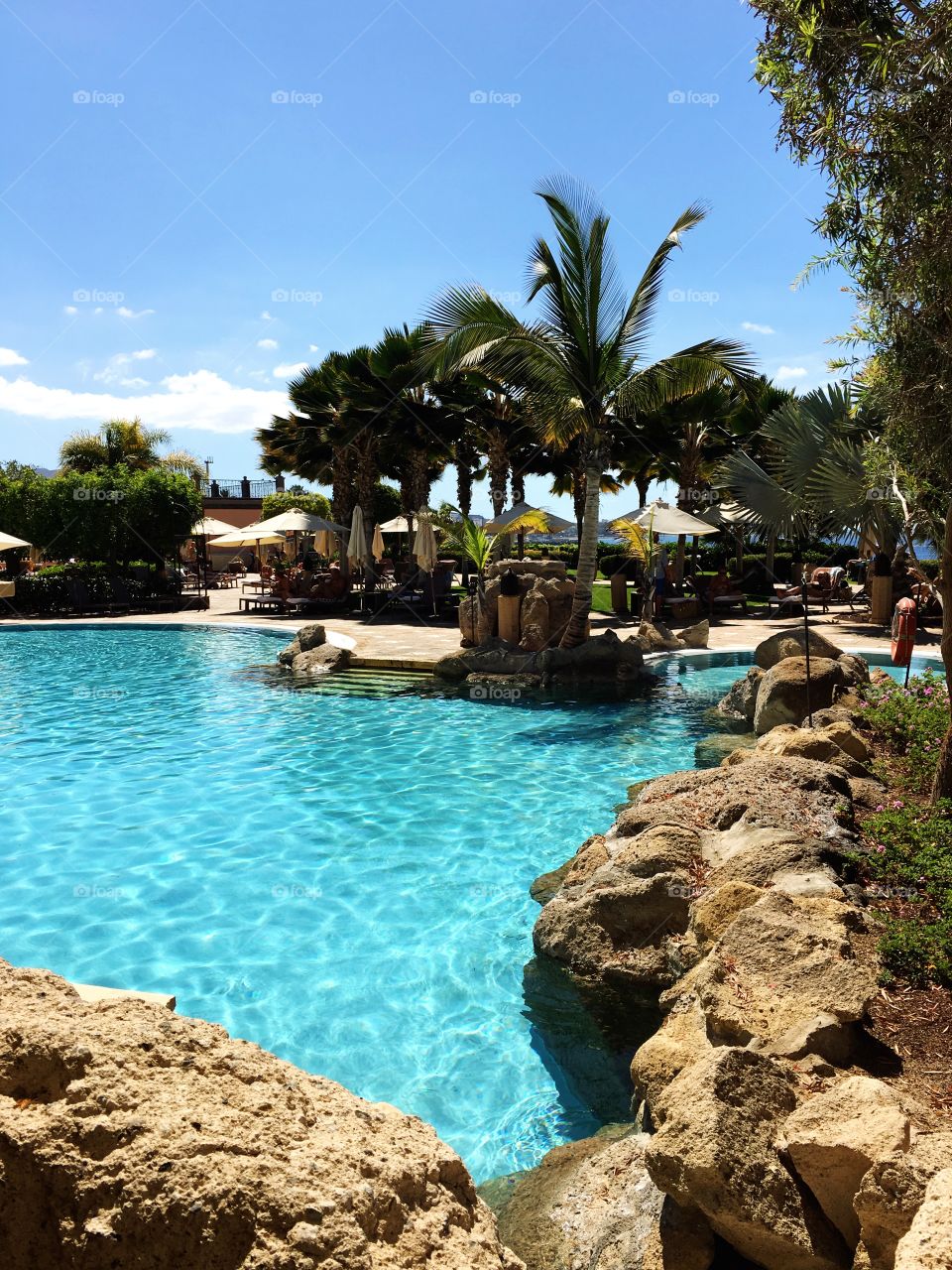 Luxury resort, relaxing by the pool